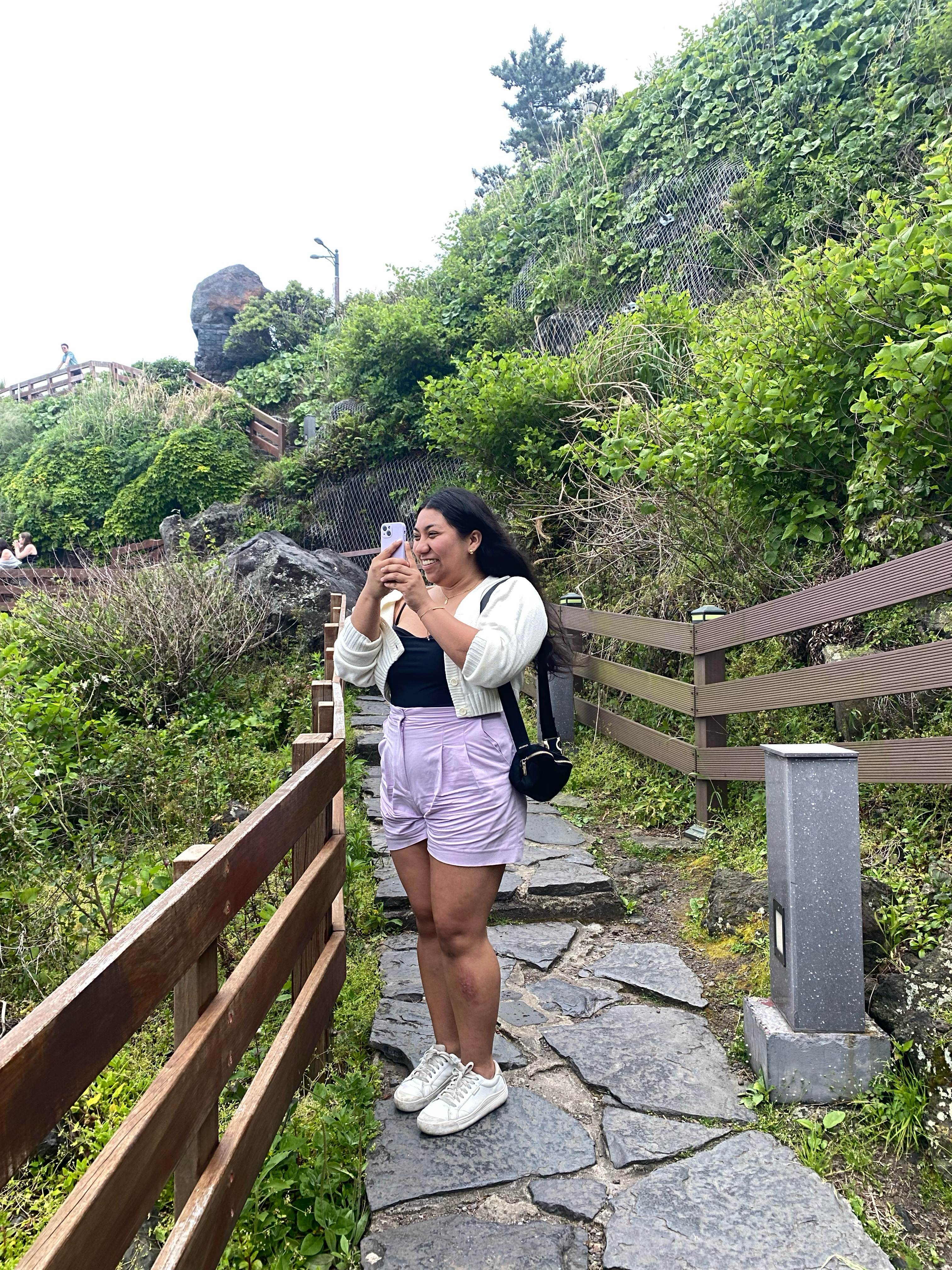 Maria Fernanda is taking a picture.