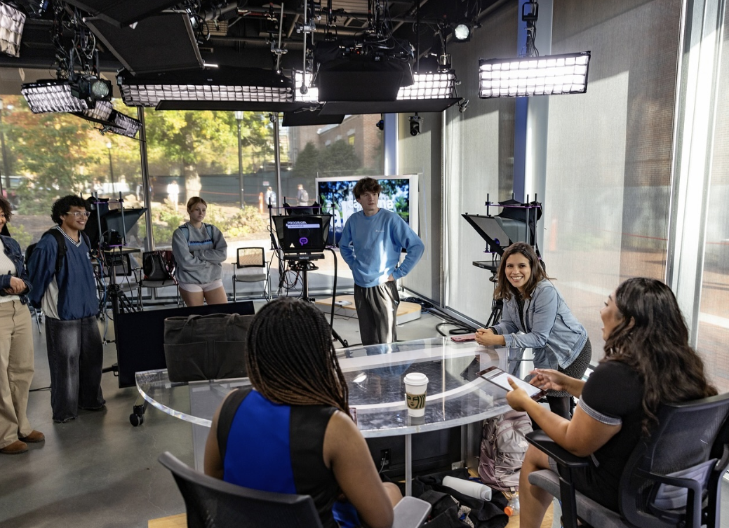 Maria Fernanda speaking in class.