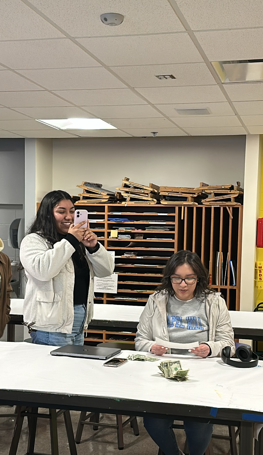 Maria Fernanda filming for a AMEXCAN reel as the Co-Communications chair.